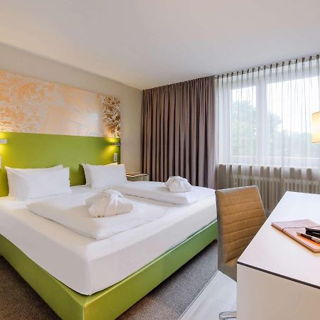 Congress Hotel Mercure Nuernberg An Der Messe Buitenkant foto